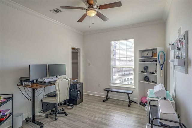 home office featuring ceiling fan, crown molding, and light hardwood / wood-style flooring