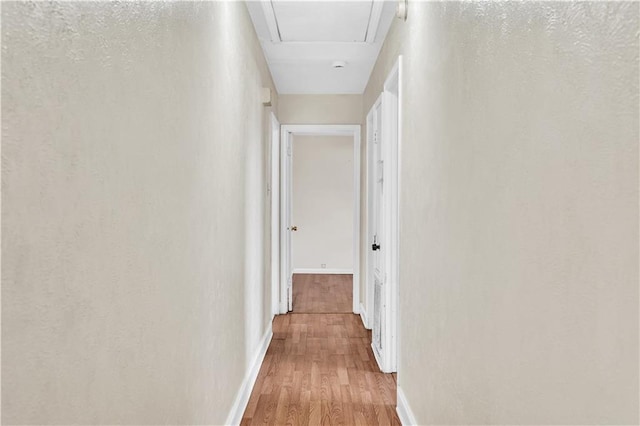 corridor featuring light wood-type flooring