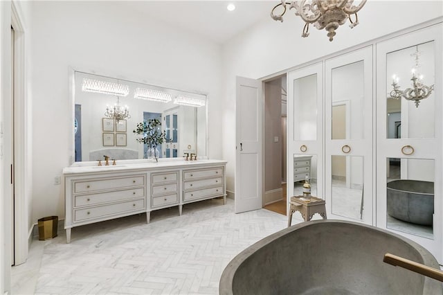 bathroom featuring vanity and parquet floors