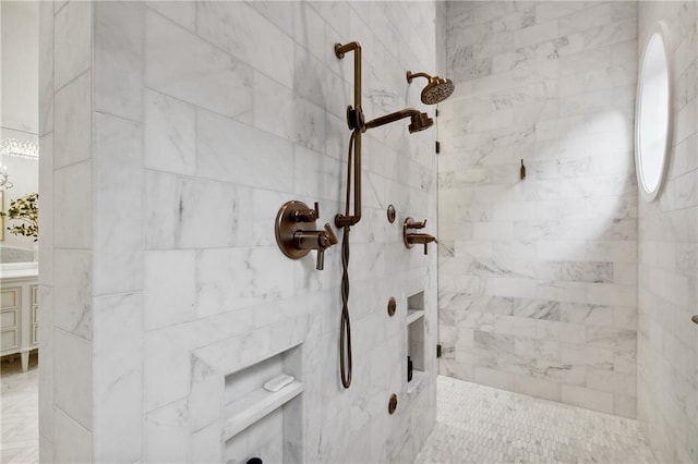 bathroom with a tile shower