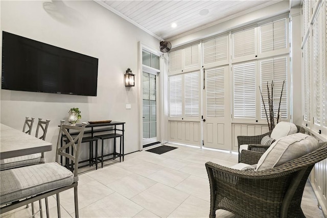 interior space featuring wooden ceiling and ornamental molding