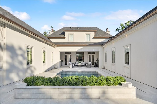 view of swimming pool with an outdoor hangout area and a patio