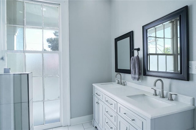 bathroom featuring vanity and tile patterned flooring