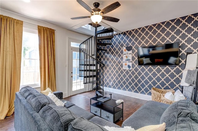 living room with dark hardwood / wood-style floors and ceiling fan