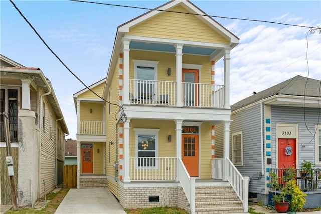 view of front facade with a porch and a balcony