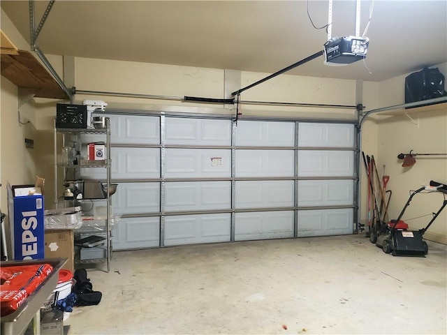 garage featuring a garage door opener