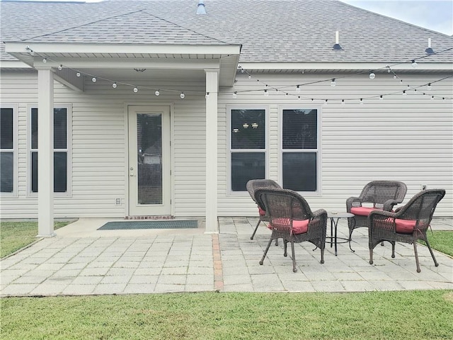 back of house with a patio