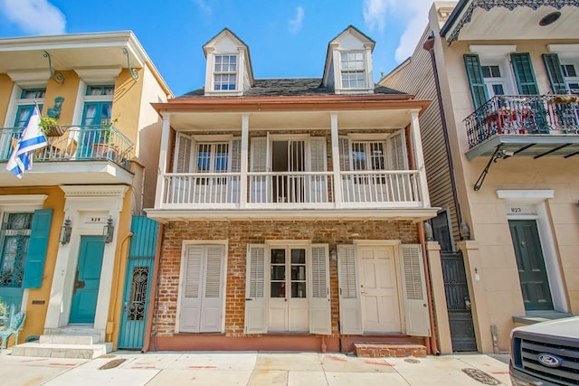 view of property featuring a balcony