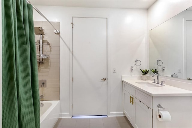 bathroom featuring tile patterned flooring, shower / tub combo, and vanity