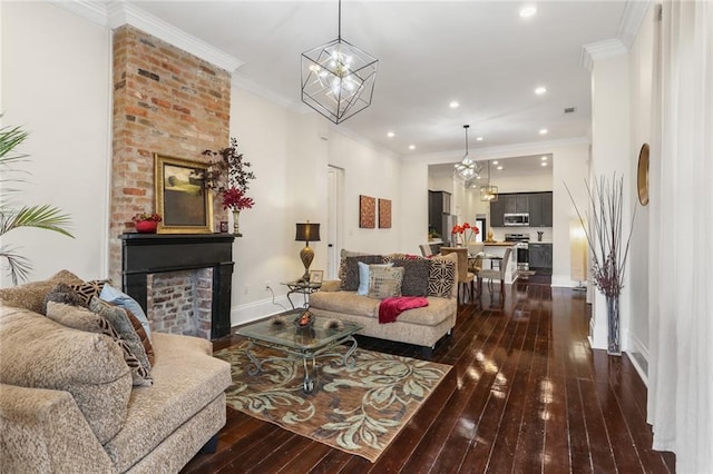 2835 Danneel St, New Orleans, LA 70115 - living room featuring a fireplace, dark wood finished floors, recessed lighting, baseboards, and a chandelier