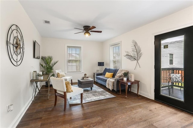 2835 Danneel St, New Orleans, LA 70115 - living room with wood finished floors, a ceiling fan, and baseboards