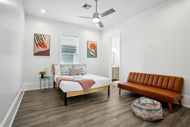 bedroom featuring ensuite bathroom, ceiling fan, and wood-type flooring