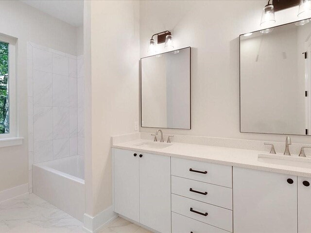 bathroom featuring vanity and a shower with shower door