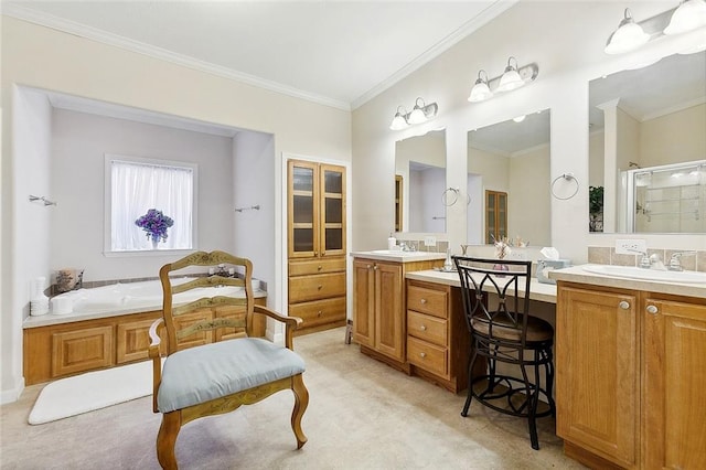 bathroom featuring vanity, crown molding, and independent shower and bath