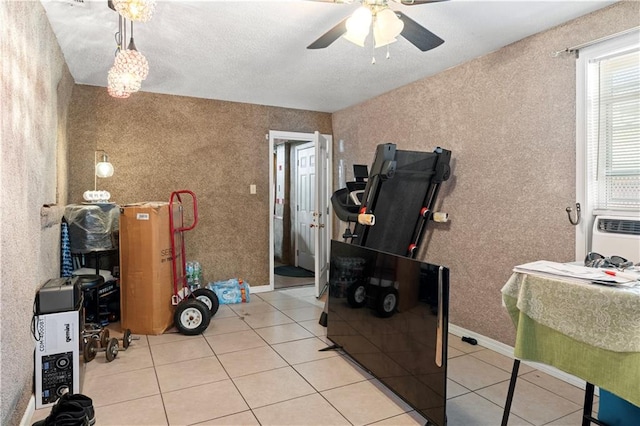 miscellaneous room featuring light tile patterned floors and ceiling fan