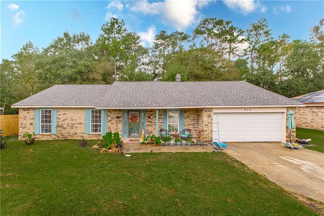 single story home with a front lawn and a garage