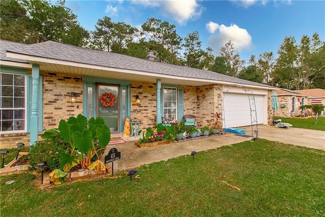 415 Driftwood Cir, Slidell, LA 70458 - single story home featuring driveway, a front lawn, brick siding, and an attached garage