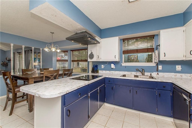 kitchen with wall chimney range hood, white cabinets, black appliances, and pendant lighting