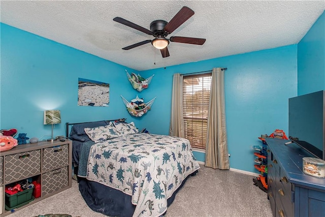 bedroom with light carpet, a textured ceiling, and ceiling fan