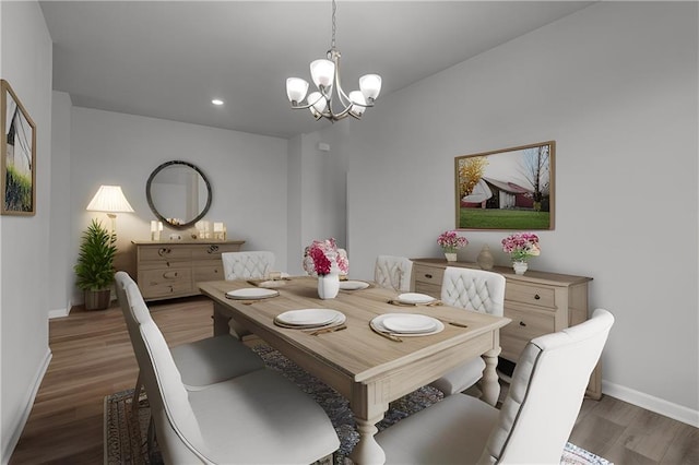 dining area featuring a chandelier and dark hardwood / wood-style floors