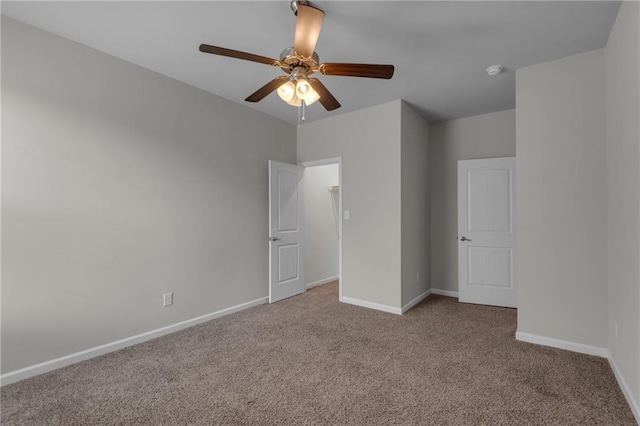 unfurnished bedroom featuring carpet flooring and ceiling fan