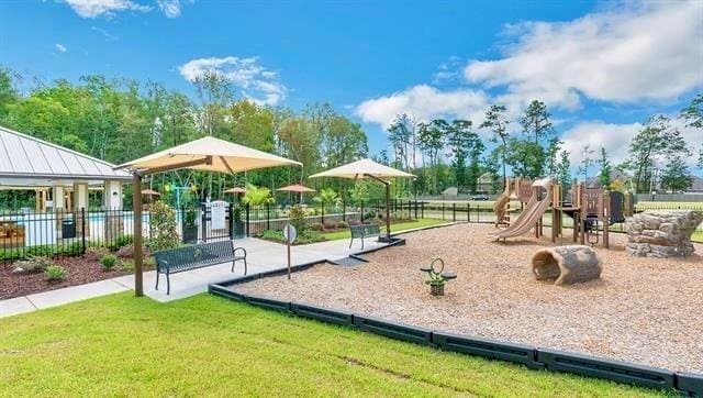 view of jungle gym featuring a yard