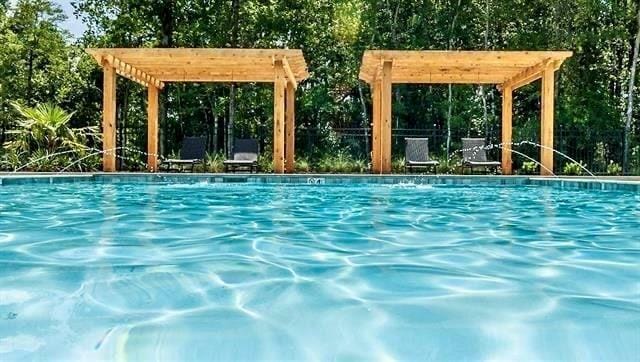 view of pool featuring a pergola