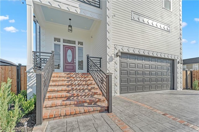 doorway to property featuring a garage