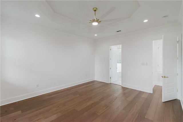 empty room with dark wood-type flooring and ceiling fan