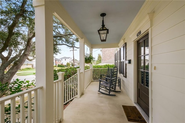 balcony featuring covered porch