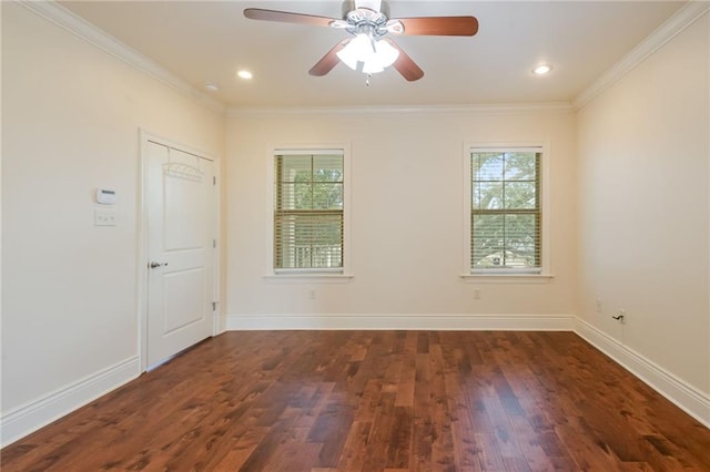 empty room featuring ornamental molding, dark hardwood / wood-style floors, and ceiling fan