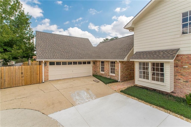 front of property with a garage