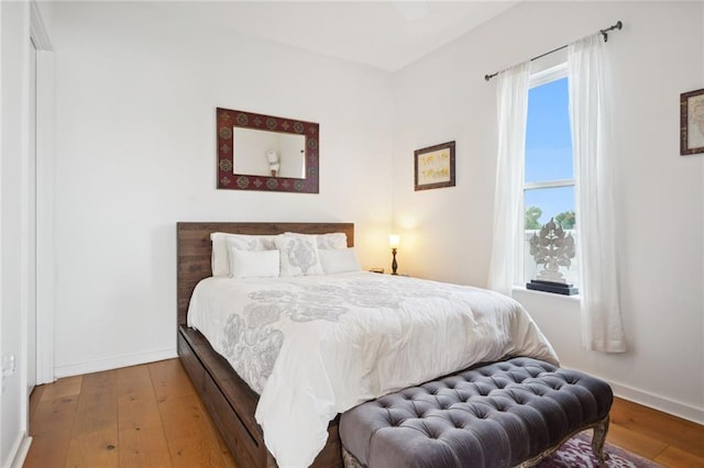 bedroom featuring hardwood / wood-style floors