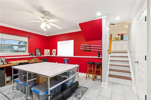 game room with ceiling fan, crown molding, and light tile patterned floors