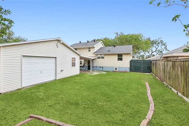 rear view of house with a lawn