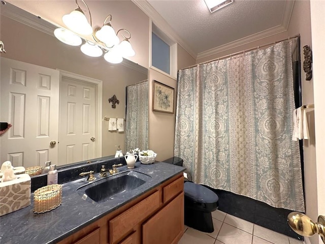 bathroom featuring toilet, tile patterned floors, a textured ceiling, ornamental molding, and vanity