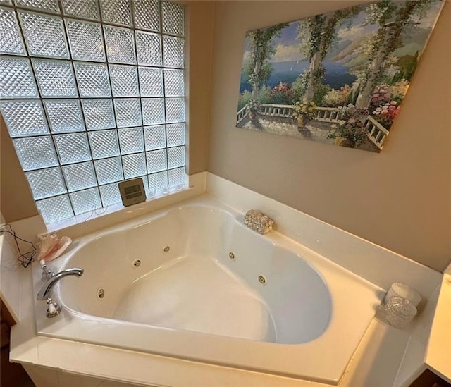 bathroom with a washtub