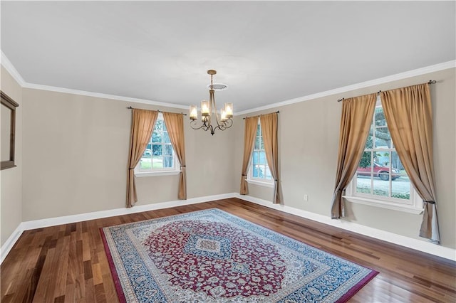 unfurnished dining area with baseboards, an inviting chandelier, and wood finished floors