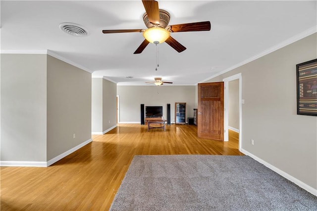 6409 Bertha Dr, New Orleans, LA 70122 - unfurnished living room with ceiling fan, wood finished floors, baseboards, and crown molding
