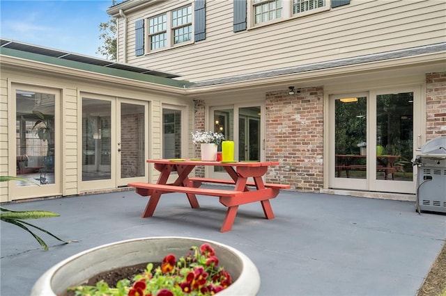 view of patio featuring area for grilling and french doors