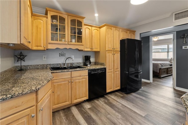 kitchen with light brown cabinetry, black appliances, sink, ornamental molding, and dark hardwood / wood-style floors