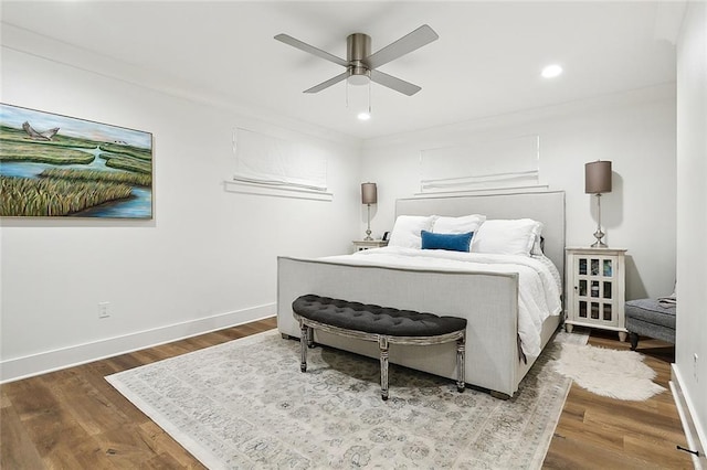 bedroom featuring ceiling fan and wood-type flooring