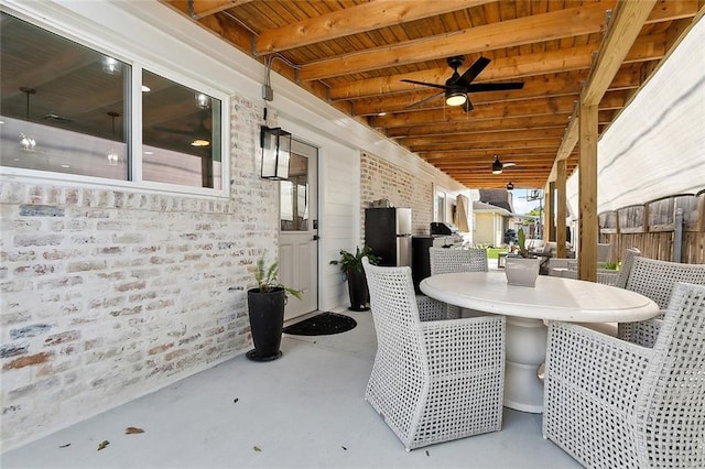 view of patio featuring ceiling fan