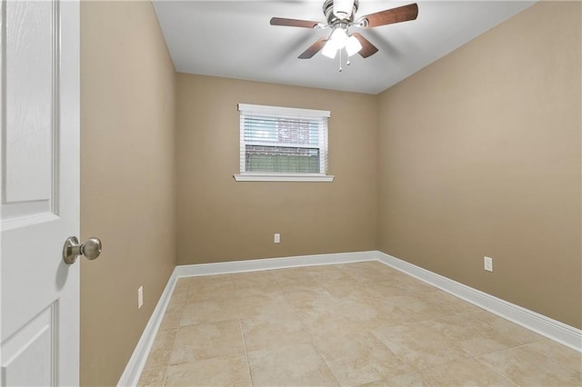 spare room with ceiling fan