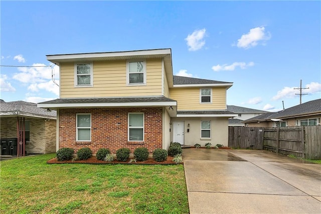 front of property featuring a front lawn