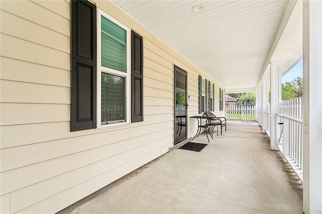 view of patio featuring a porch