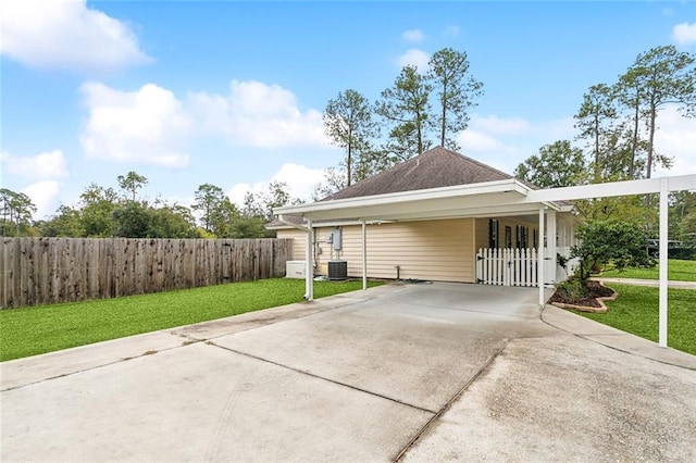 view of property exterior featuring a yard and a carport