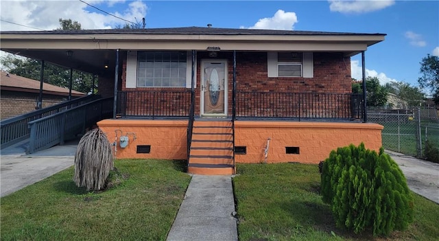1925 Pailet Ave, Harvey, LA 70058 - view of front facade with a front lawn and covered porch