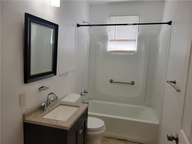 full bathroom featuring vanity, washtub / shower combination, and toilet