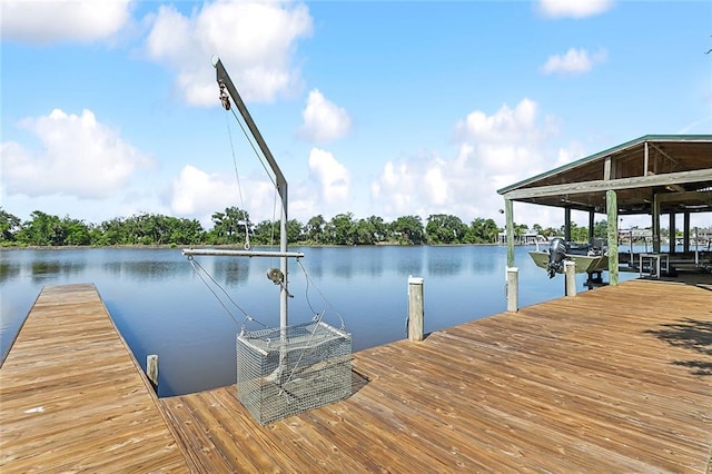 view of dock with a water view and boat lift